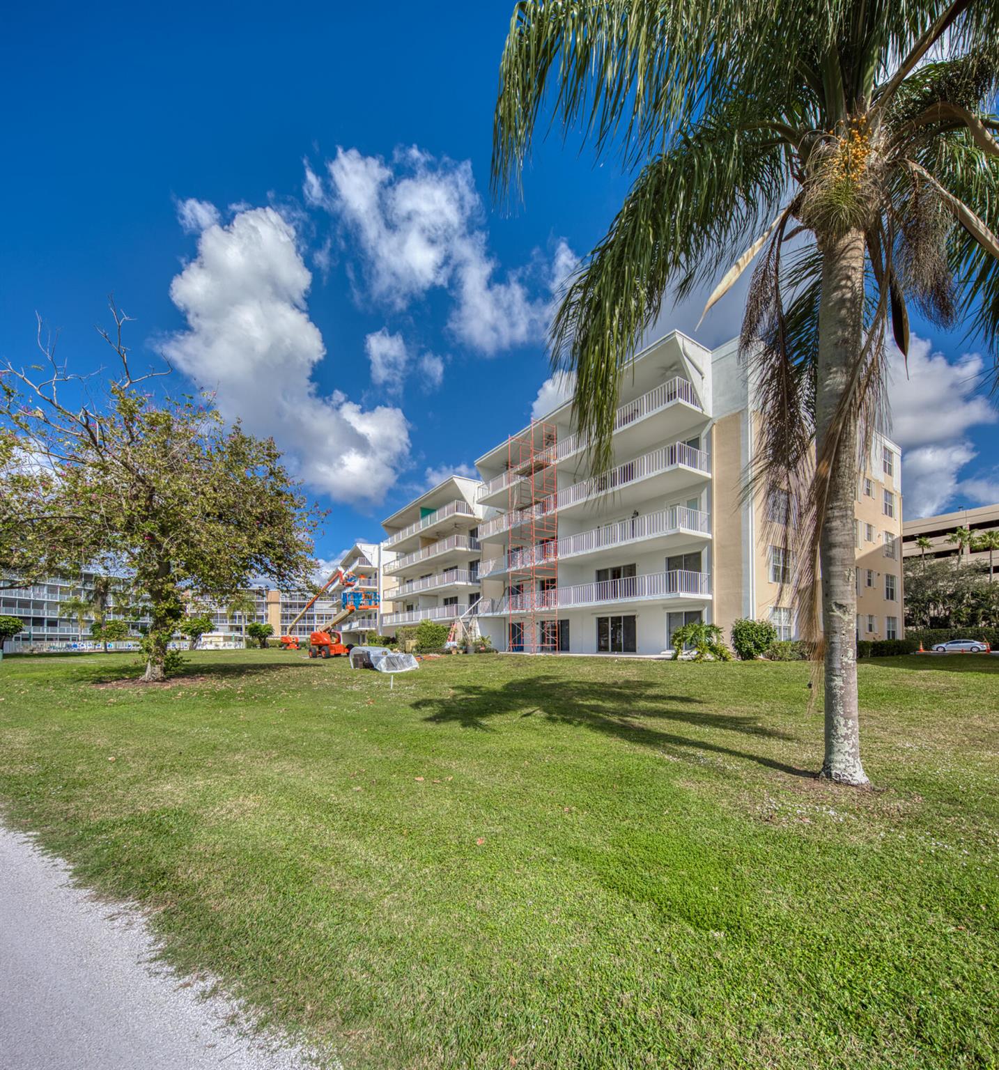 En-suite plus guest bedroom and bath with impressive room sizes, a Florida room and oversized balcony (8x24!) overlooking golf and lake with beautiful trees to break up the view. This unit has a lovely updated kitchen, tons of storage (linen closets, a walk-in plus more), in-unit stackable washer & dryer and a covered parking space right at the bottom of the stairs for your convenience. Sold fully furnished and ready for occupancy! Absolutely turn-key. Wonderful community in the City of Atlantis with it's unique lifestyle. Treat yourself!Leasing is allowed twice a year with a 2 month minimum, basic cable is included. All pet requests must be approved by the board.