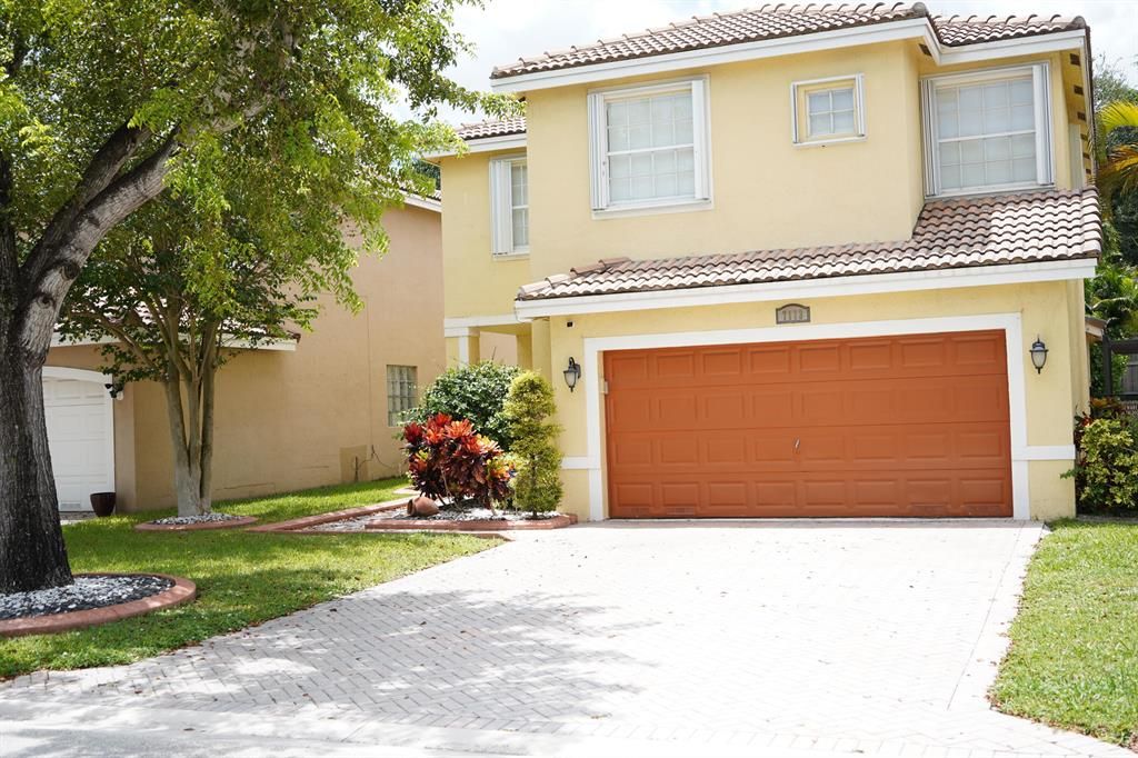 Photo of 7113 Crescent Creek Lane Ln, Coconut Creek, FL 33073 (MLS # R10826960)