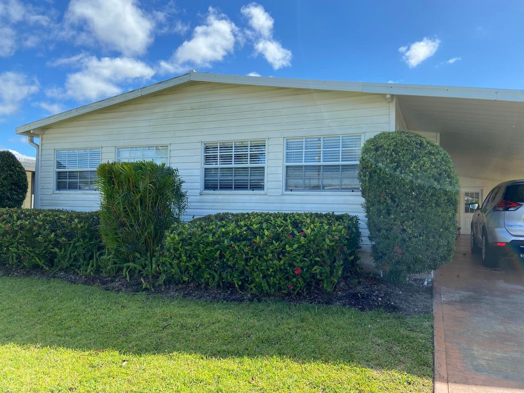 Photo of 7848 SE Continental Drive, Hobe Sound, FL 33455 (MLS # R10805865)