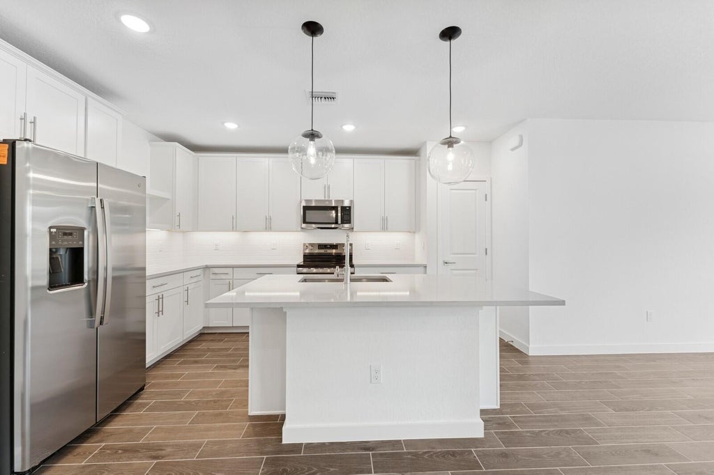Photo of 302 Silver Sands Lane #16, Fort Pierce, FL 34945 (MLS # R11094022)