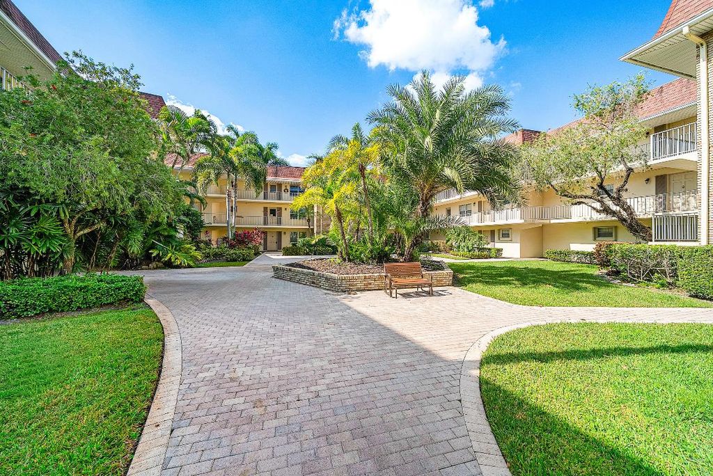 Photo of 5540 Tamberlane Circle #221, Palm Beach Gardens, FL 33418 (MLS # R11143380)