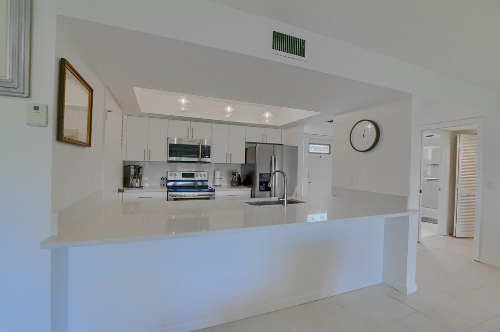 Photo of 20025 Boca West Drive #3065, Boca Raton, FL 33434 (MLS # B26065492)