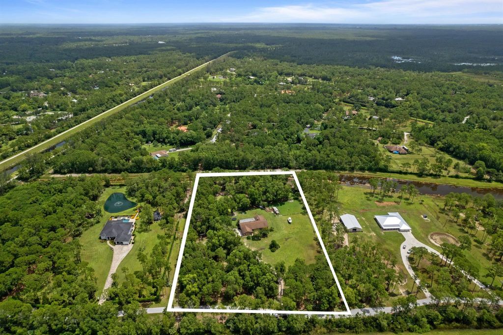 Photo of 13080 Arrowwood Drive, West Palm Beach, FL 33418 (MLS # R10902453)