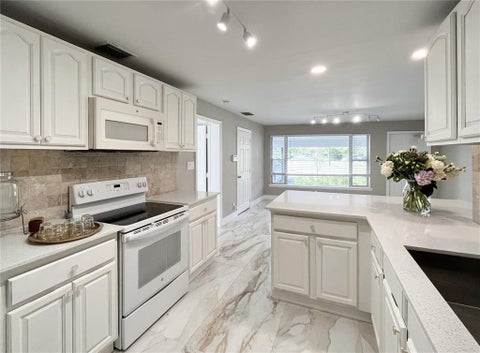 Tiny photo for 1010 NE 24TH Street, Pompano Beach, FL 33064 (MLS # B26085377)