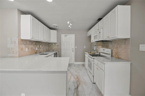 Tiny photo for 1010 NE 24TH Street, Pompano Beach, FL 33064 (MLS # B26085377)