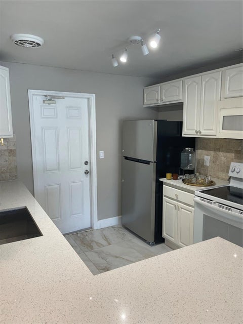 Tiny photo for 1010 NE 24TH Street, Pompano Beach, FL 33064 (MLS # B26085377)