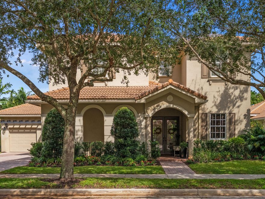 Welcome to your South Florida paradise retreat WITH A BRAND NEW ROOF. This beautifully maintained 5-bedroom 4.5 bathrooms pool home with a den and a loft offer over 3,500 sq. ft. of elegant living. Enter through etched double doors to soaring volume ceilings with crown molding, modern lighting, wrought iron staircase with tile and wood floors.  The traditional floor plan features a formal living and dining room perfect for a family gatherings.  Gourmet kitchen with tall wood cabinets , granite counters, stainless steel appliances, double wall ovens and a wine refrigerator.  A eat in breakfast area which opens to the family room, giving seamless access to the covered patio and pool. The luxurious first-floor owner's suite boasts a spa-like bath and a giant walk-in closet with built-ins.    Two additional bedrooms and a den are also on the main level, while upstairs offers two more bedrooms and a large loft/play area. Step outside to the lushly landscaped private backyard, ideal for entertaining with a covered patio and a sparkling freeform turquoise pool with spa. There is also an open paver patio for sunbathing or additional seating areas, a cabana bath, and a fully fenced yard. Located in the highly sought-after Paseos community with tree-lined streets, pool, playground, tennis courts, clubhouse, and green spaces, this home puts you in the heart of Jupiter—minutes from pristine beaches, world-clas