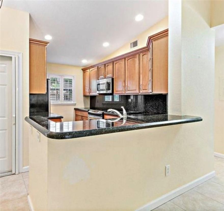 Beautiful renovated home in Windwood Condo. Walking distance to FAU, near the beach, Mizner Park and Town Center Mall. Washer/Drier in unit . Open kitchen concept perfect for entretaining, plantation shutters, stainless appliances and granite counter tops. High ceilings and great patio views from the Florida room. Condo has amazing amenities : pool, dog park, bike trail, tennis courts, basketball and racket ball.