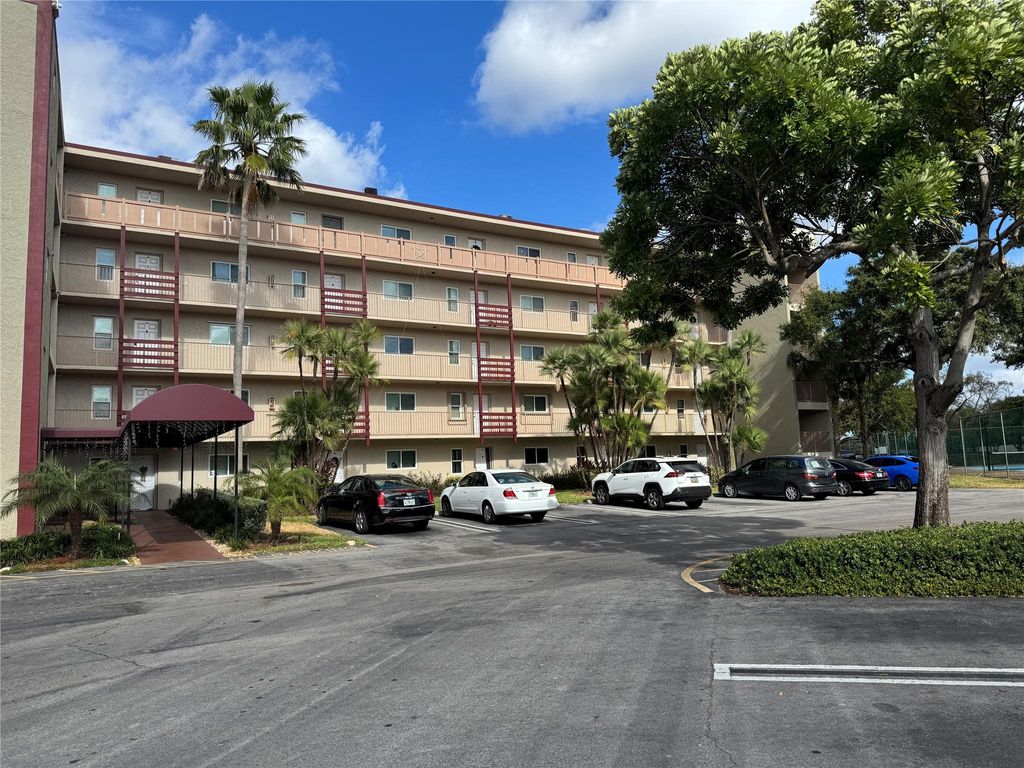 Photo of 2104 S Cypress Bend Drive #405, Pompano Beach, FL 33306 (MLS # F10480710)