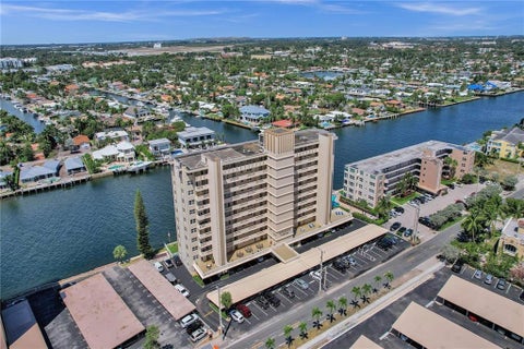Photo of 303 N Riverside Drive #PH4, Pompano Beach, FL 33062 (MLS # B26090395)
