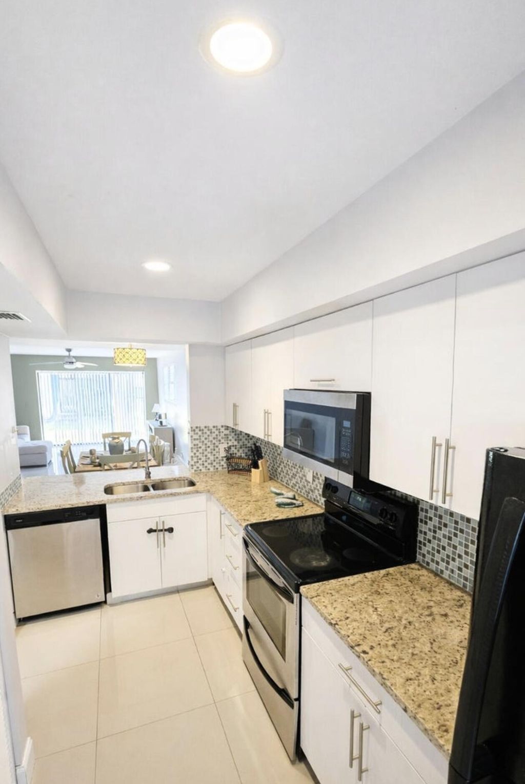 Photo of 11596 NW 45th Street #4, Coral Springs, FL 33065 (MLS # R11162950)