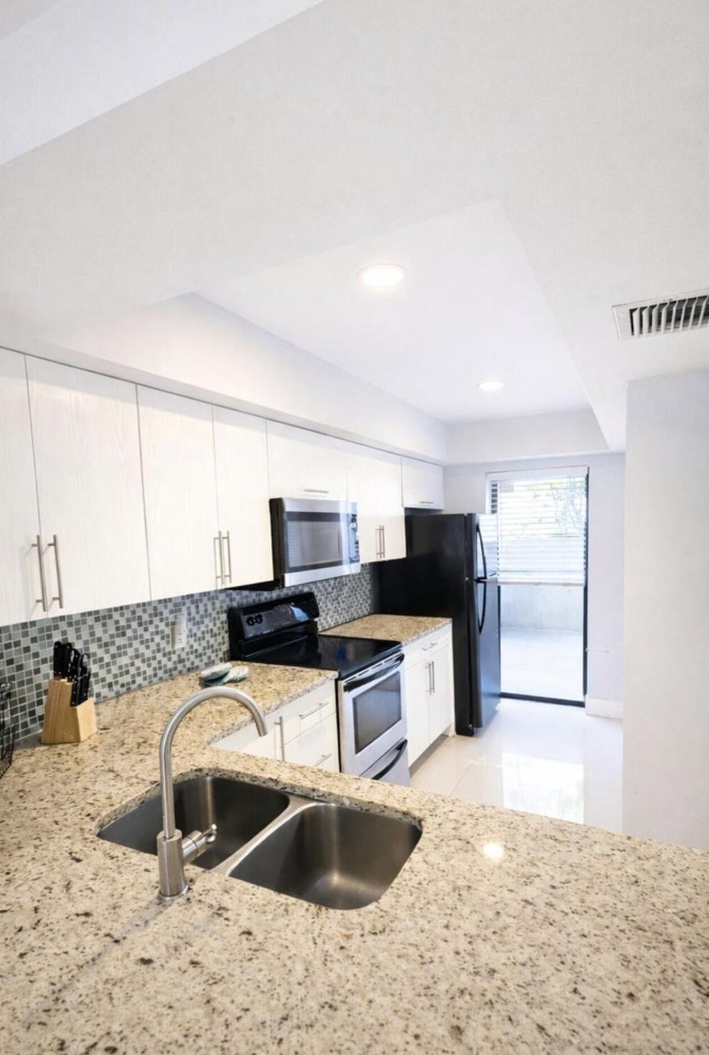 Photo of 11596 NW 45th Street #4, Coral Springs, FL 33065 (MLS # R11162950)