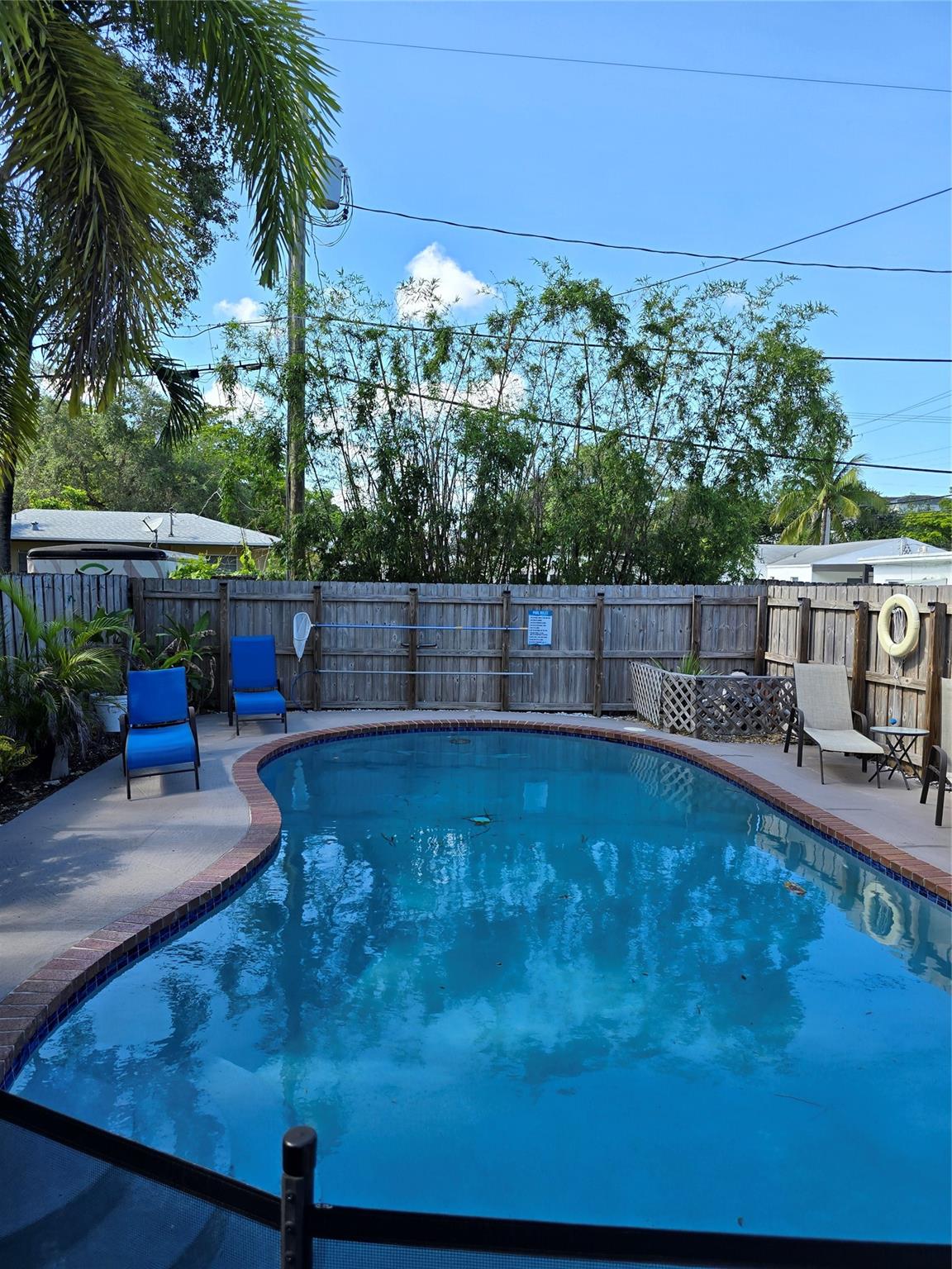 This is a fully furnished 1 bedroom apartment (utilities included) with a fully equipped kitchen, refrigerator, microwave, toaster oven, coffee machine, plates, bowls, glasses, utensils, king size bed, end tables, lamps, black out curtains in the bedroom, a desk, towels and 1 set of linen. It is located in a duplex. There is a designated parking space right outside your door. There are security cameras all around the house and a coin operated laundry room with 1 washer & 1 dryer. The backyard has a pool,2 tables with chairs a BBQ grill that needs to be shared with other guests. The property is located within walking distance (0.4Miles) of Broward Health on Andrews Ave and about 6 Miles to Nova University. Available starting today until the end of December 2025. Call for details.