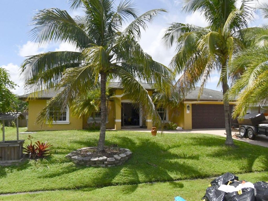 Photo of 1234 SW Asturia Avenue, Port Saint Lucie, FL 34953 (MLS # B26001532)