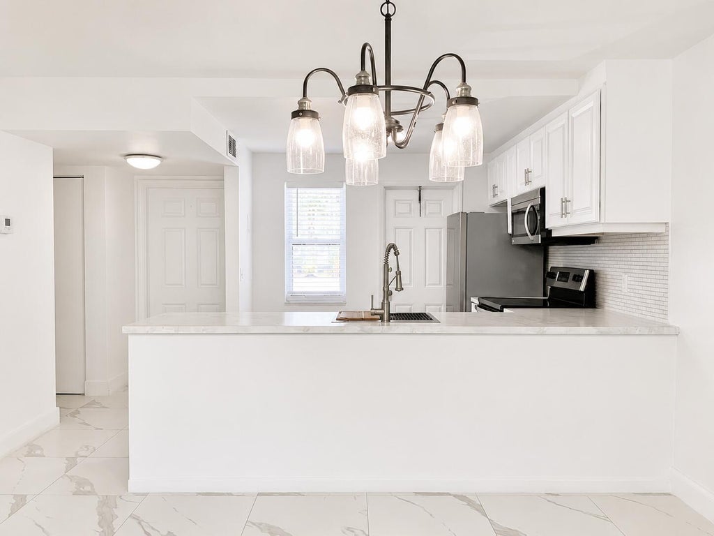 Photo of 600 NE 2ND Street #105, Dania Beach, FL 33004 (MLS # B26071263)