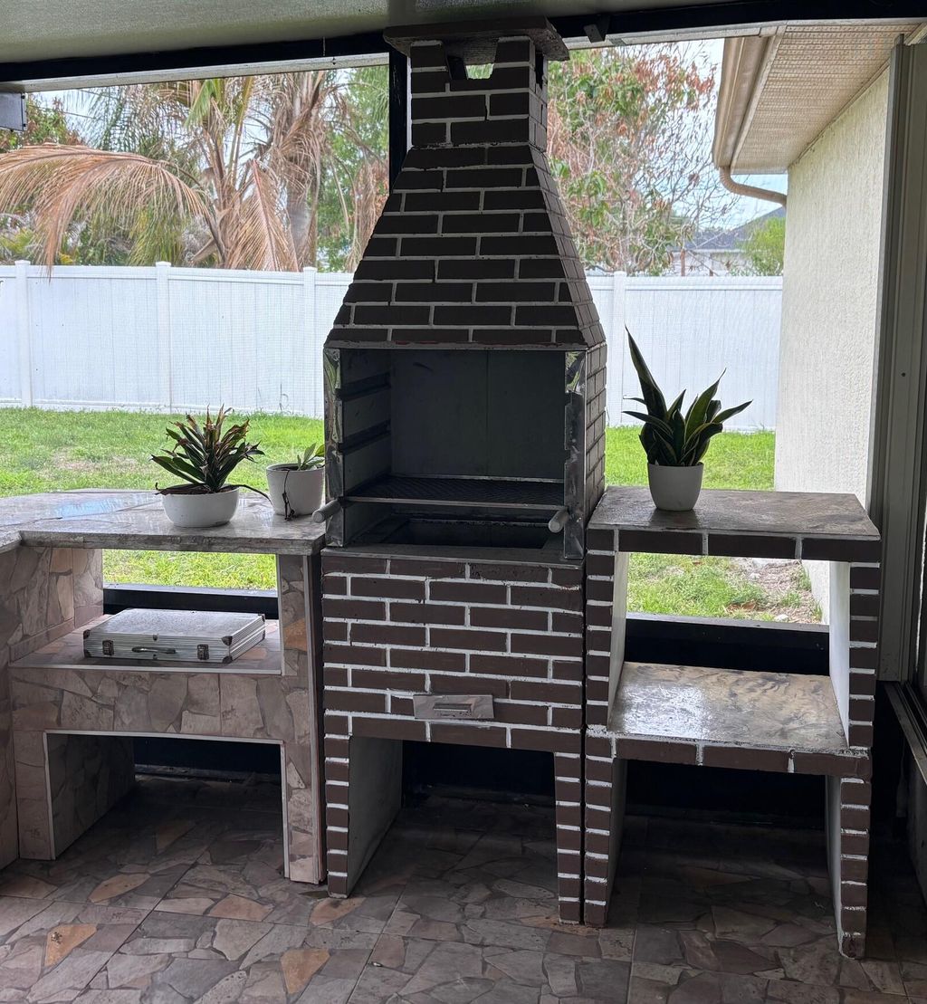 Photo of 3660 SW Bonwold Street, Port Saint Lucie, FL 34953 (MLS # B26013925)