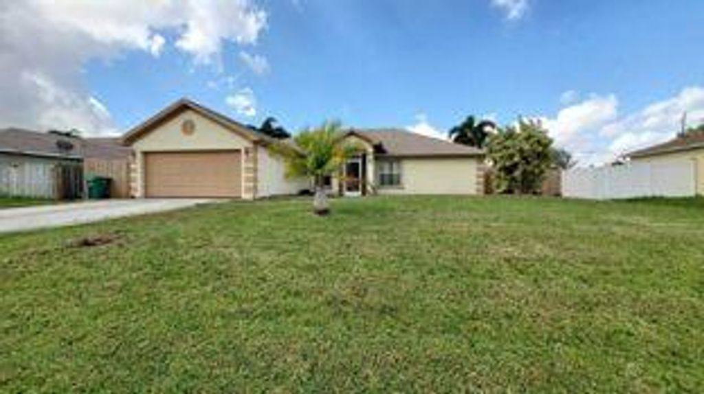 Photo of 3660 SW Bonwold Street, Port Saint Lucie, FL 34953 (MLS # B26013925)
