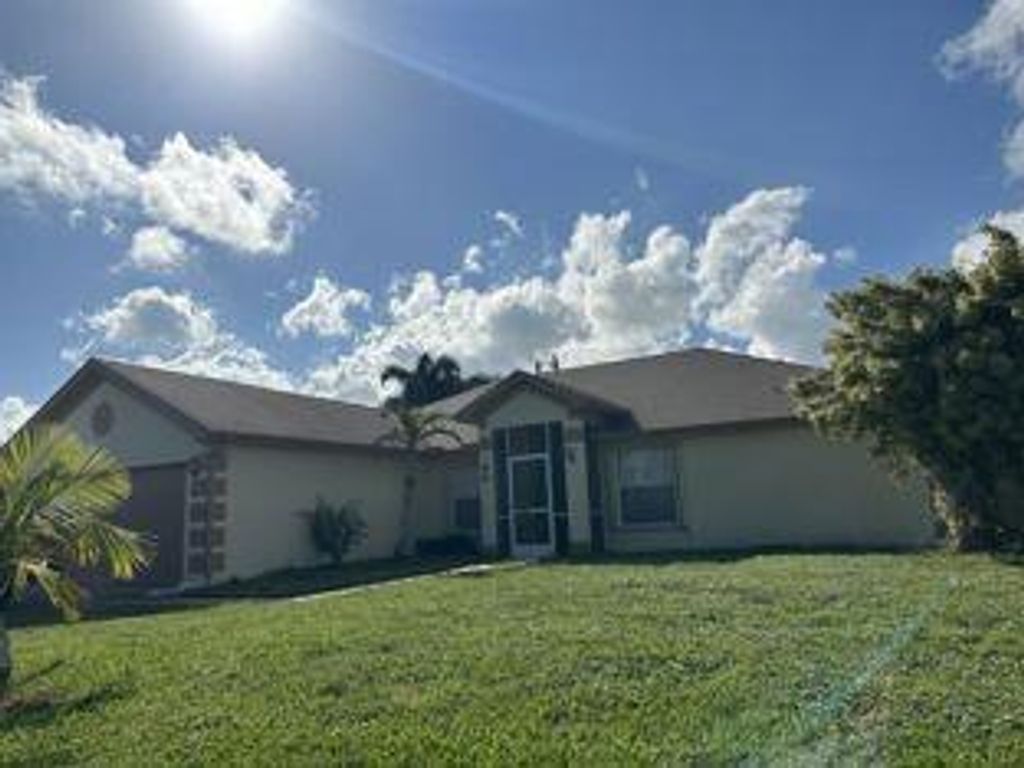 Photo of 3660 SW Bonwold Street, Port Saint Lucie, FL 34953 (MLS # B26013925)