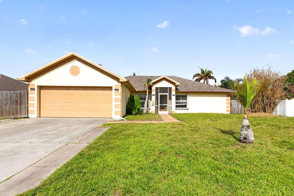 Photo of 3660 SW Bonwold Street, Port Saint Lucie, FL 34953 (MLS # B26013925)