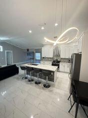 3660 SW Bonwold Street, Port St Lucie, FL, 34953/$398,500 2 3660 SW Bonwold Street