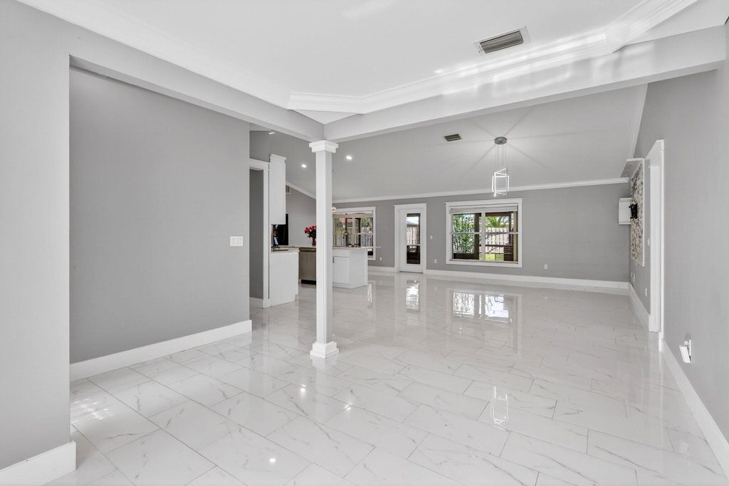 Photo of 3660 SW Bonwold Street, Port Saint Lucie, FL 34953 (MLS # B26013925)