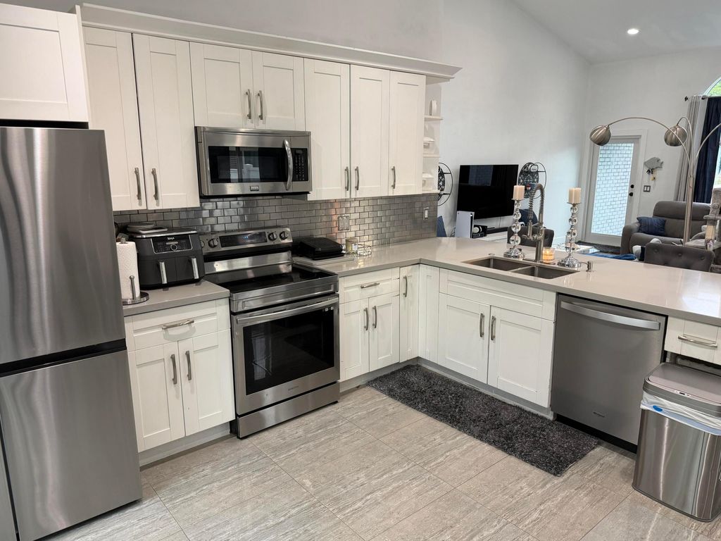 Photo of 8097 Cedar Hollow Lane, Boca Raton, FL 33433 (MLS # B26002308)