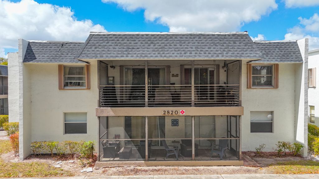 Photo of 2820 Riverside Dr #203, Coral Springs, FL 33065 (MLS # B26000352)