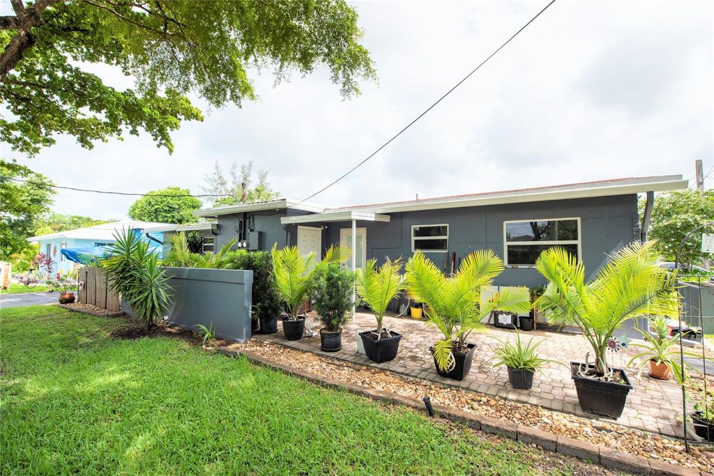 Photo of 3621 NE 8th Ave, Oakland Park, FL 33334 (MLS # F10392020)