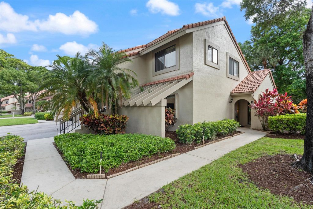 Photo of 5620 Coach House Circle #D, Boca Raton, FL 33486 (MLS # R11098256)