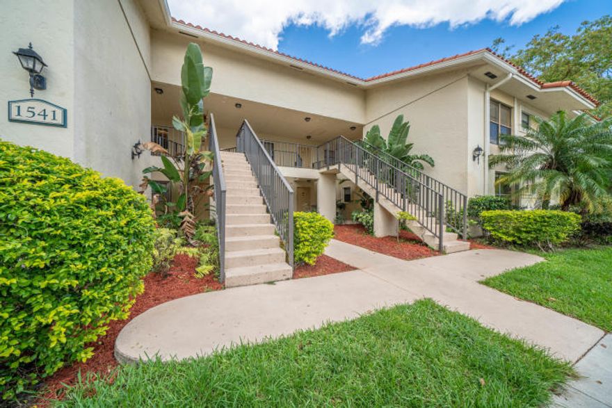 Immaculate three bedroom two bathroom, top floor condo featuring granite counter tops in the kitchen and bathrooms, stainless steel appliances, and a full size washer and dryer.  Tiled living rooms, brand new laminate in all bedrooms, walk in closet in the master bedroom, additional closet space in each bedroom and two full bathrooms. Enjoy a serene nature view from your balcony as charming deer make occasional surprise appearances!  Community offers three swimming pools, clubhouse, exercise room, on site security & management, tennis court and more! Conveniently located in West Palm Beach near shopping, parks, restaurants, and airport.