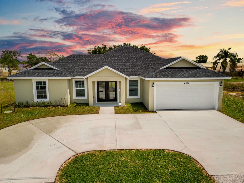 Photo of 3517 SW Port St Lucie Boulevard W, Port Saint Lucie, FL 34953 (MLS # R10944639)