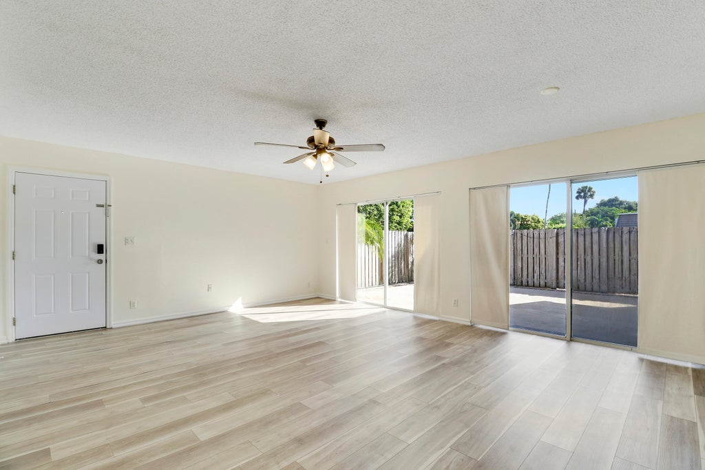 Photo of 4348 HAZEL Avenue #D, Palm Beach Gardens, FL 33410 (MLS # B26062850)