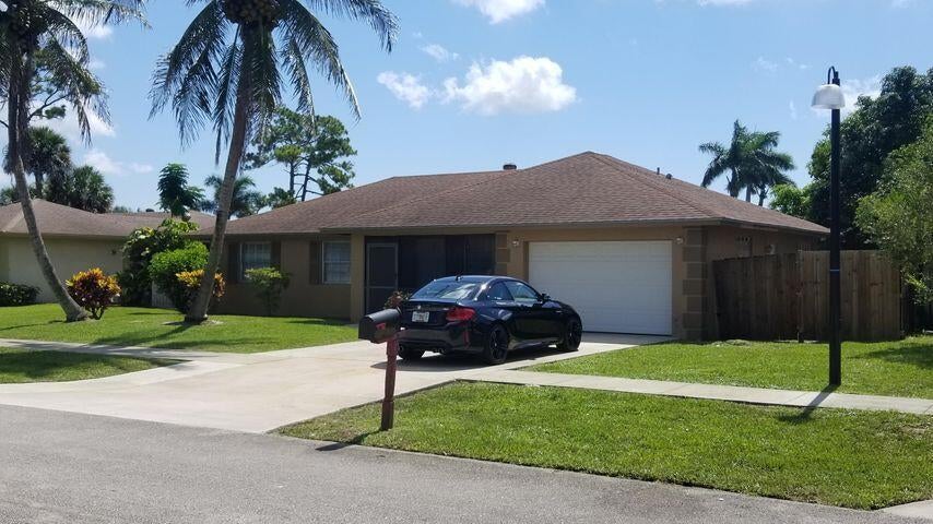 Photo of 788 RYANWOOD Drive, West Palm Beach, FL 33413 (MLS # B26078345)