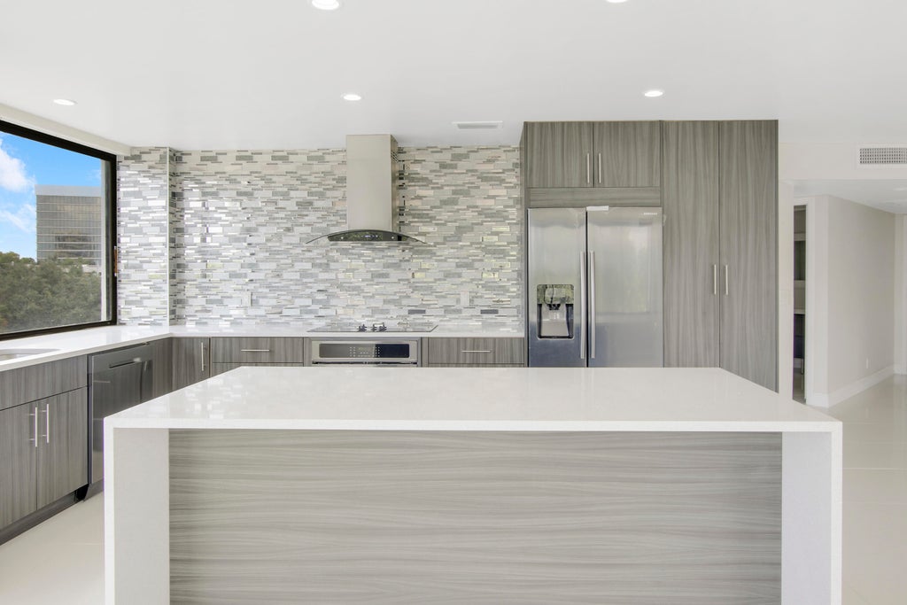 Photo of 1500 Presidential Way #404, West Palm Beach, FL 33401 (MLS # B26044892)