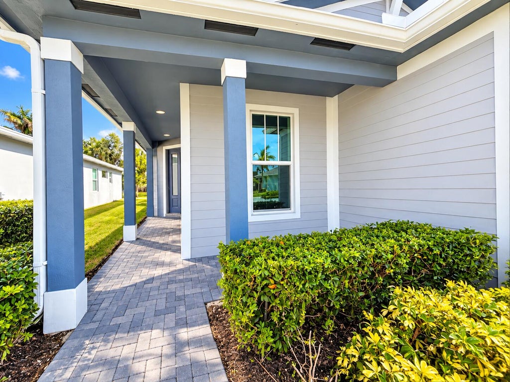 Photo of 11197 SW Lyra Drive, Port Saint Lucie, FL 34987 (MLS # B26080396)