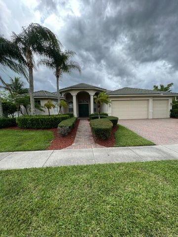 BEAUIFUL LAKEFRONT 5 BEDROOM, 3 BATH HOME WITH A LARGE FENCED YARD FOR ENTERTAINING BY THE OVERSIZED POOL. UPGRADED KITCHEN WITH COOKS ISLAND. CLUBOUSE HAS FITNESS CENTER, TENNIS COURTS, AND POOL. CLOSE TO WELLINGTON POLO & EQUESTRIAN, WELLINGTON GREEN MALL, SHOPPING, DINNING AND ''A'' Rated Schools!