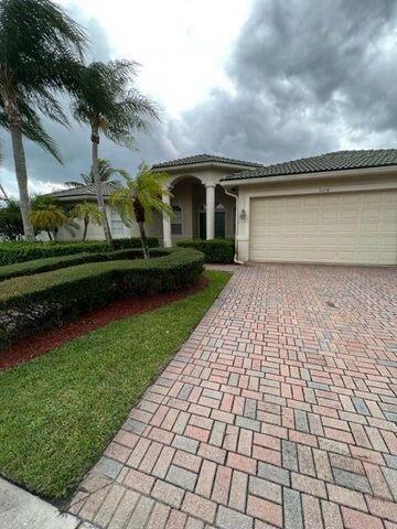 BEAUIFUL LAKEFRONT 5 BEDROOM, 3 BATH HOME WITH A LARGE FENCED YARD FOR ENTERTAINING BY THE OVERSIZED POOL. UPGRADED KITCHEN WITH COOKS ISLAND. CLUBOUSE HAS FITNESS CENTER, TENNIS COURTS, AND POOL. CLOSE TO WELLINGTON POLO & EQUESTRIAN, WELLINGTON GREEN MALL, SHOPPING, DINNING AND ''A'' Rated Schools!