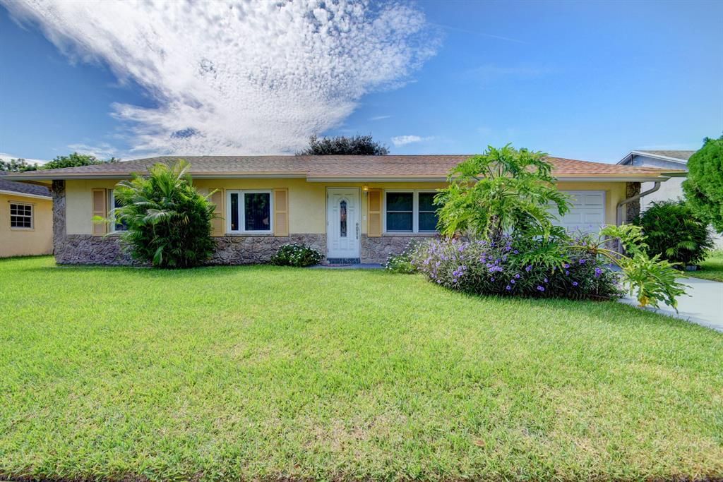 Photo of 207 Wrena Drive, West Palm Beach, FL 33409 (MLS # R10754262)