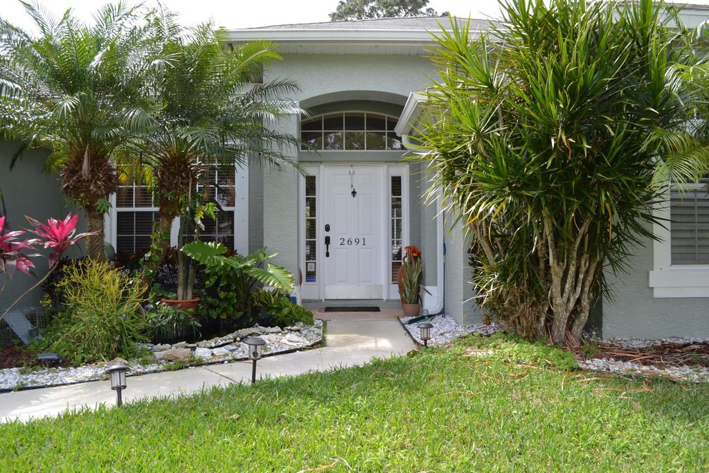 Photo of 2691 SW Ace Road, Port Saint Lucie, FL 34953 (MLS # R10965192)