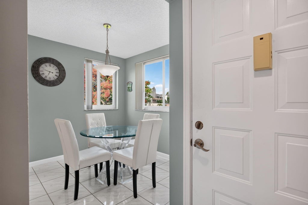 Photo of 7216 S Devon Drive #212, Tamarac, FL 33321 (MLS # B26043666)