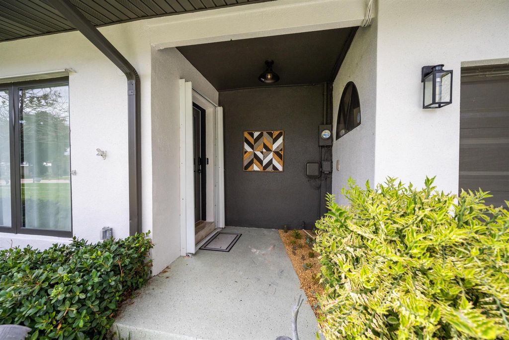 Photo of 3256 SE Monte Vista Street, Port Saint Lucie, FL 34952 (MLS # R11041672)