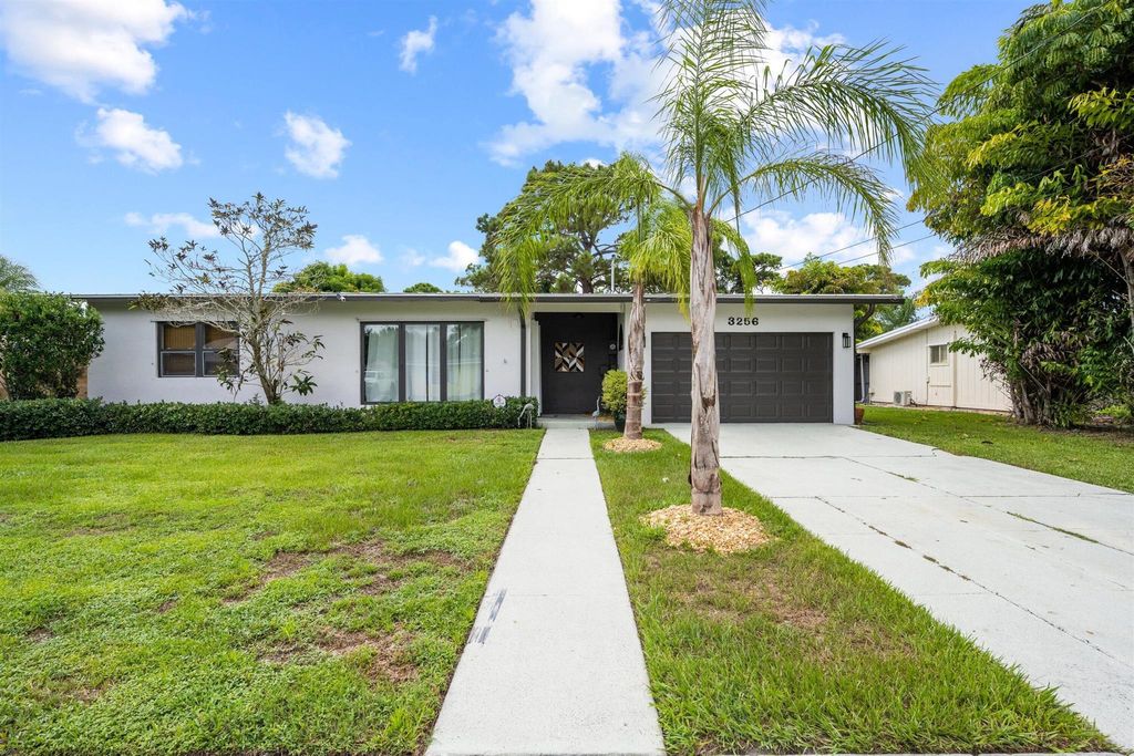 Photo of 3256 SE Monte Vista Street, Port Saint Lucie, FL 34952 (MLS # R11041672)