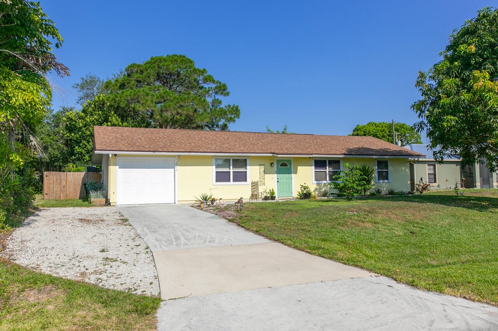 Photo of 1742 SW Cloverleaf Street, Port Saint Lucie, FL 34953 (MLS # R10991398)
