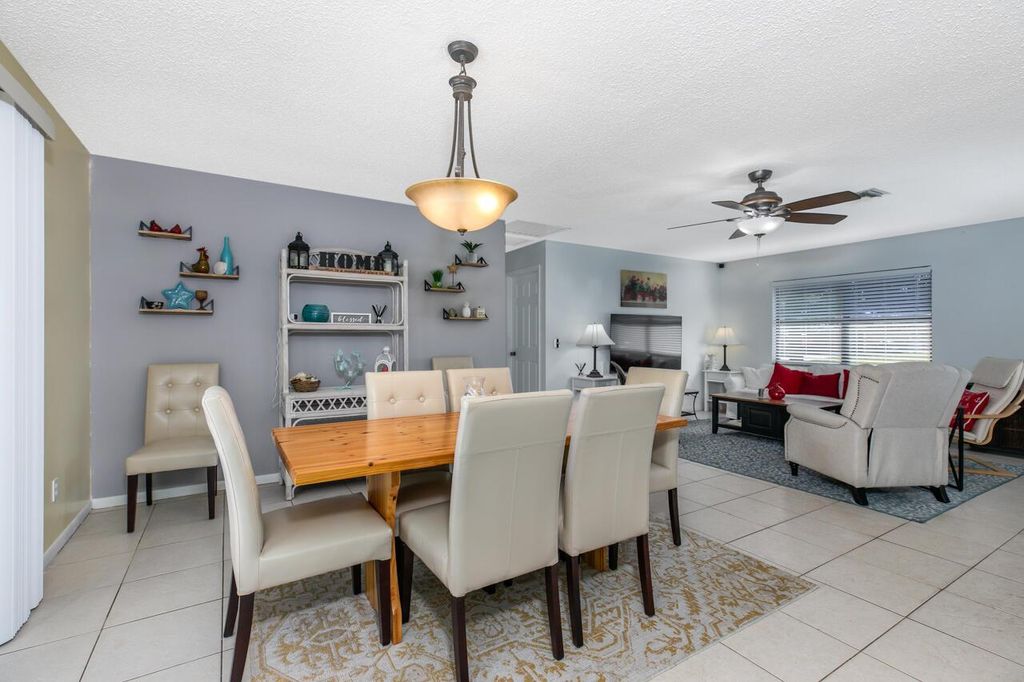 Photo of 1742 SW Cloverleaf Street, Port Saint Lucie, FL 34953 (MLS # R10991398)