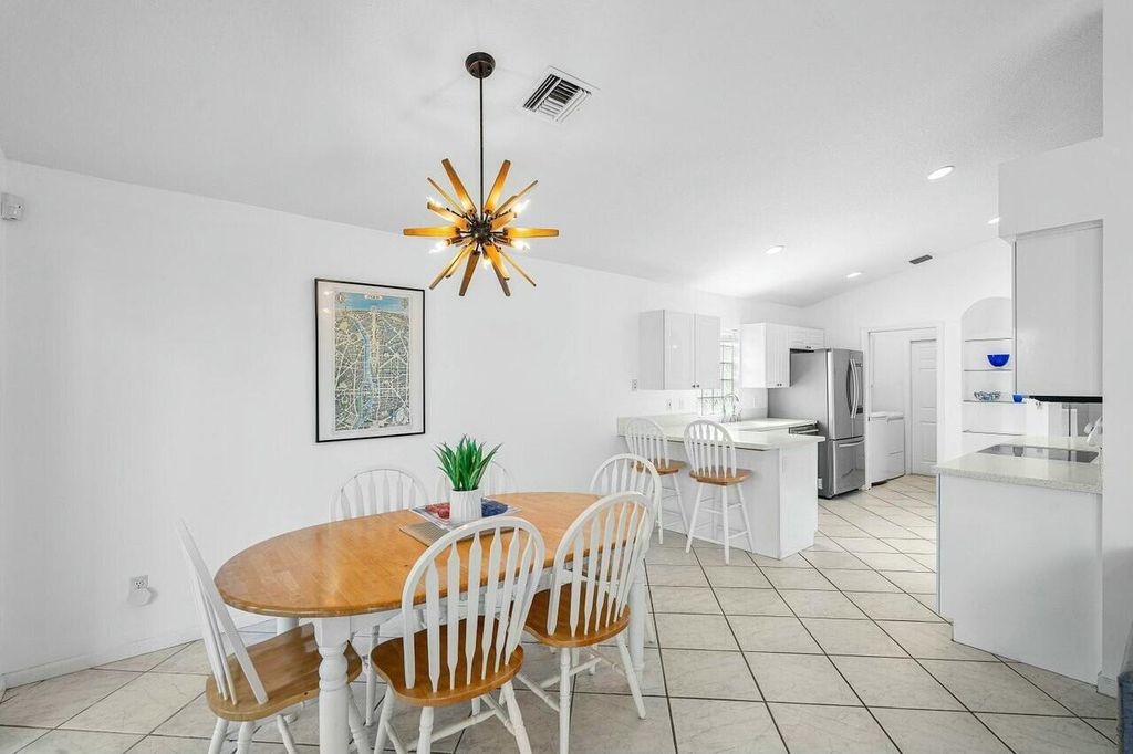 Photo of 1643 Oak Berry Circle, Wellington, FL 33414 (MLS # B26029859)