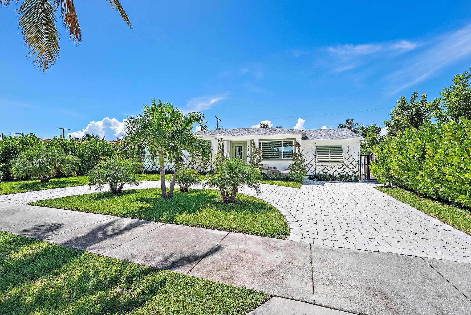 Welome to Casita SoSoLocated in West Palm Beach's highly desirable South of Southern (''SoSo'') neighborhood, this newly renovated single-story home combines high-end design, modern technology, and resort-style amenities. With a circular drive and lush tropical landscaping, it's just minutes from the Intracoastal, beaches, downtown West Palm Beach, and Palm Beach International Airport. The light-filled interior welcomes you with Thibaut wallpaper in the entry and flows into an open-concept living area with new floors, Bose surround sound, and Sonos mobile speakers for entertainment. The gourmet kitchen features quartz countertops, stainless steel appliances, reverse osmosis water filtration, and abundant storage, connecting seamlessly to the dining space. The primary suite offers