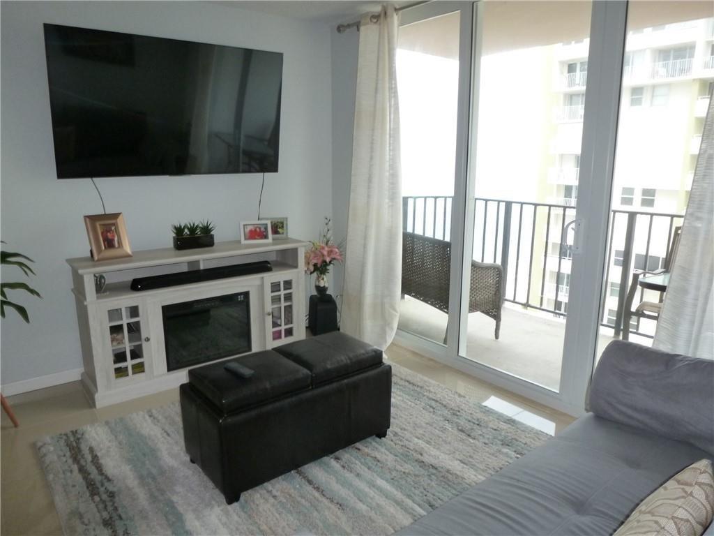 Southern facing condo in one of Pompano Beaches most sought after condos. Located right on the Beach Boardwalk just a short distance from the fishing pier. Amenities galore in the beachfront condo featuring a fabulous recreation center with multiple game rooms, swimming pool, exercise room, an amazing private bottle club on the top floor with panoramic ocean views. Secure garage parking for one car and awesome views of the ocean from the condo's open balcony. Walk to fantastic shops and restaurants. Resort style living at it's best! Live year round in this 2/2 condo with 24 hour manned security in secure lobby.
