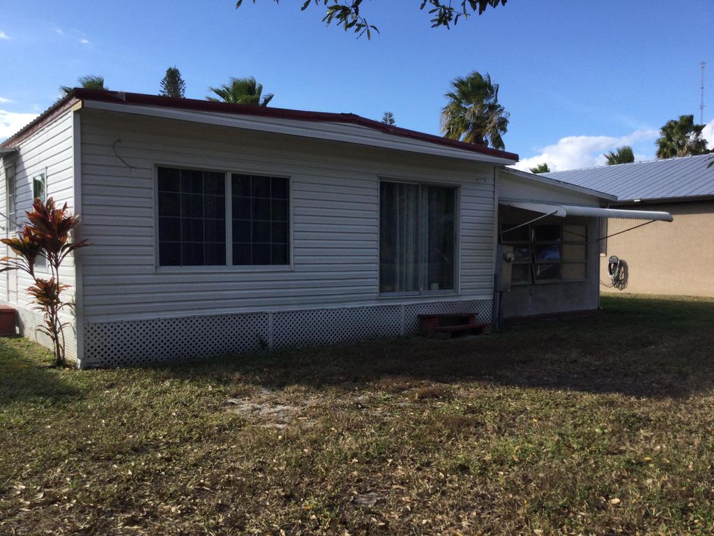 Photo of 42 Golf Drive, Port Saint Lucie, FL 34952 (MLS # R11130717)