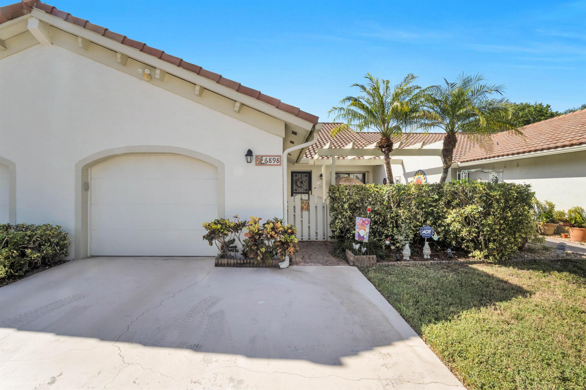 Welcome to Tiburon II! This Boca Raton gem offers the perfect blend of style and comfort with open living spaces, updated finishes, and private outdoor charm. Enjoy resort-style amenities including a sparkling pool, clubhouse, and tennis courts, all maintained by the HOA for stress-free living. Nestled minutes from shopping, dining, and top-rated schools, this home is ideal for those seeking convenience with a touch of luxury. Pets welcome; community managed with care, move in and start living the Boca lifestyle today!
