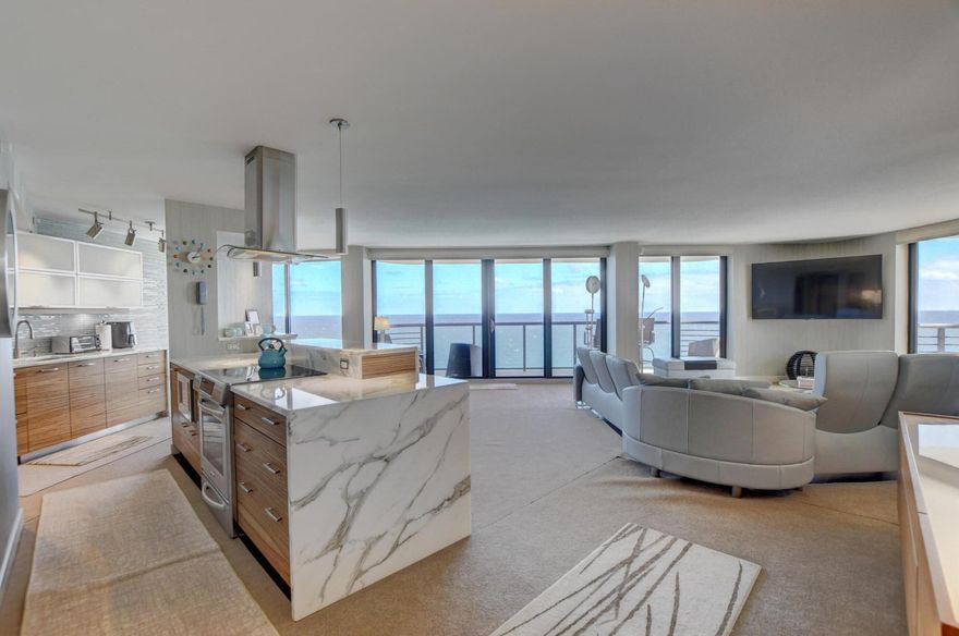 Breathtaking Southeast Corner Lower Penthouse nestled in the heart of Boca Raton. Enjoy the beauty of both direct ocean sunrises and serene Lake Boca sunsets from your wrap-around balconies. Designer Kitchen and the main living room both have ash wood floors (in the photo they are temporarily covered with carpet). Renovated. Luxury master suite with a Japanese soaking tub, heated floors and heated towel bar. unit has control 4 and a lot of closets!! Located near downtown. Beach access, boating, tennis, pickleball. Come enjoy South Florida!!